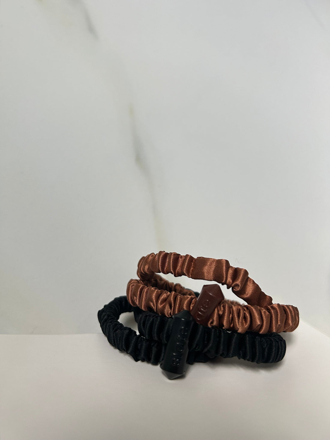 Hair Growth vs. Length Retention: Why the Difference Matters (And How the Slate Scrunchie Can Help)